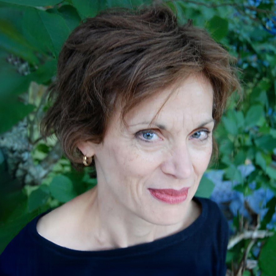 A woman with short, brown hair. 